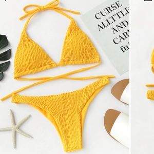 Never been worn! Yellow smocked tie bathing suit